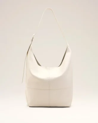 Etienne crossbody-veske i hvitt Taurillon-lær